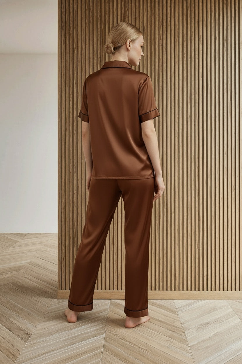 Back pose of the model wearing KCW Pijama de Seda Para Mujer Satin 2 Piece Pajamas Set Button Down Silky Pjs Short Sleeve Sleepwear