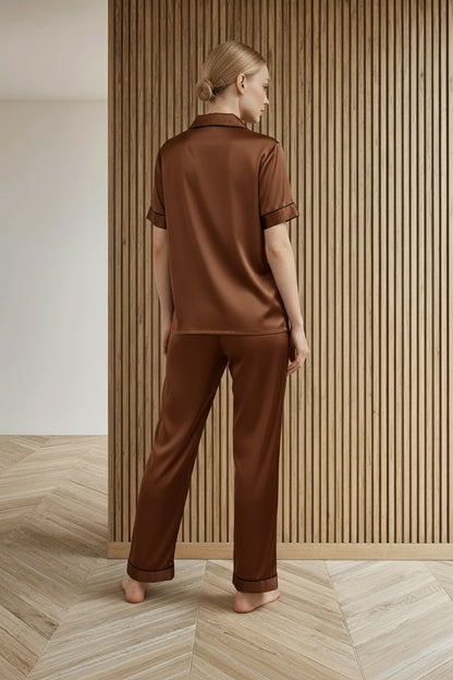 Back pose of the model wearing KCW Pijama de Seda Para Mujer Satin 2 Piece Pajamas Set Button Down Silky Pjs Short Sleeve Sleepwear