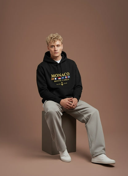 Model sitting while wearing Oversize Loose Casual Hoodies For Men