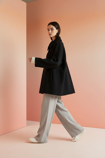 Model walking while wearing Winter Wool Coat